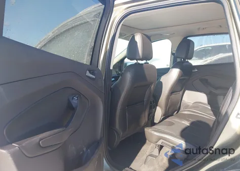 2013 Ford Escape Titanium z USA, uszkodzony, nr VIN 1FMCU0J90DUC43431